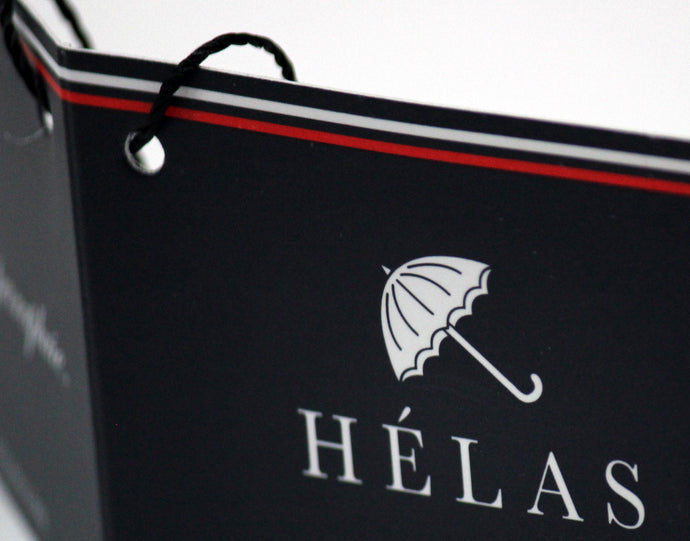 HÉLAS
